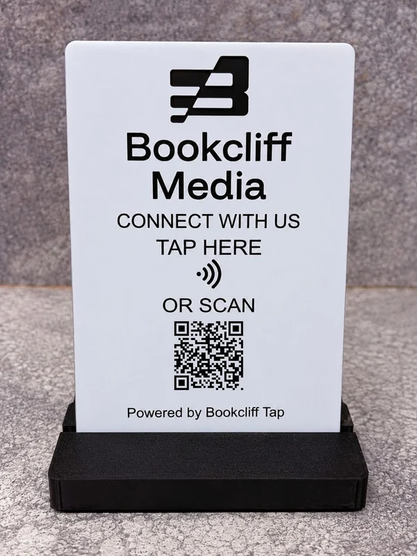 Front view of a personalized 4 by 6 inch acrylic Bookcliff Tap Sign in its stand